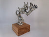 Handcrafted pewter Speed Demon ornament with sleek curves and detailed sculptural finish