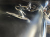 Solid pewter Speed Demon hood ornament showcasing detailed sculpting and flowing lines