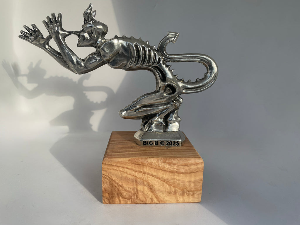 Polished metal Speed Demon automotive hood ornament inspired by classic hot rod styling