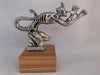 Handcrafted Speed Demon hood ornament sculpted in solid polished pewter metal